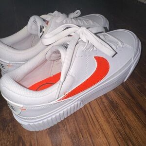 Red and white Nike court legacy shoes